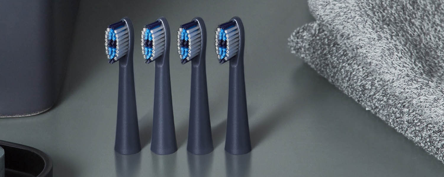 MultiShape electric toothbrush head replacements sits on top of a bathroom counter