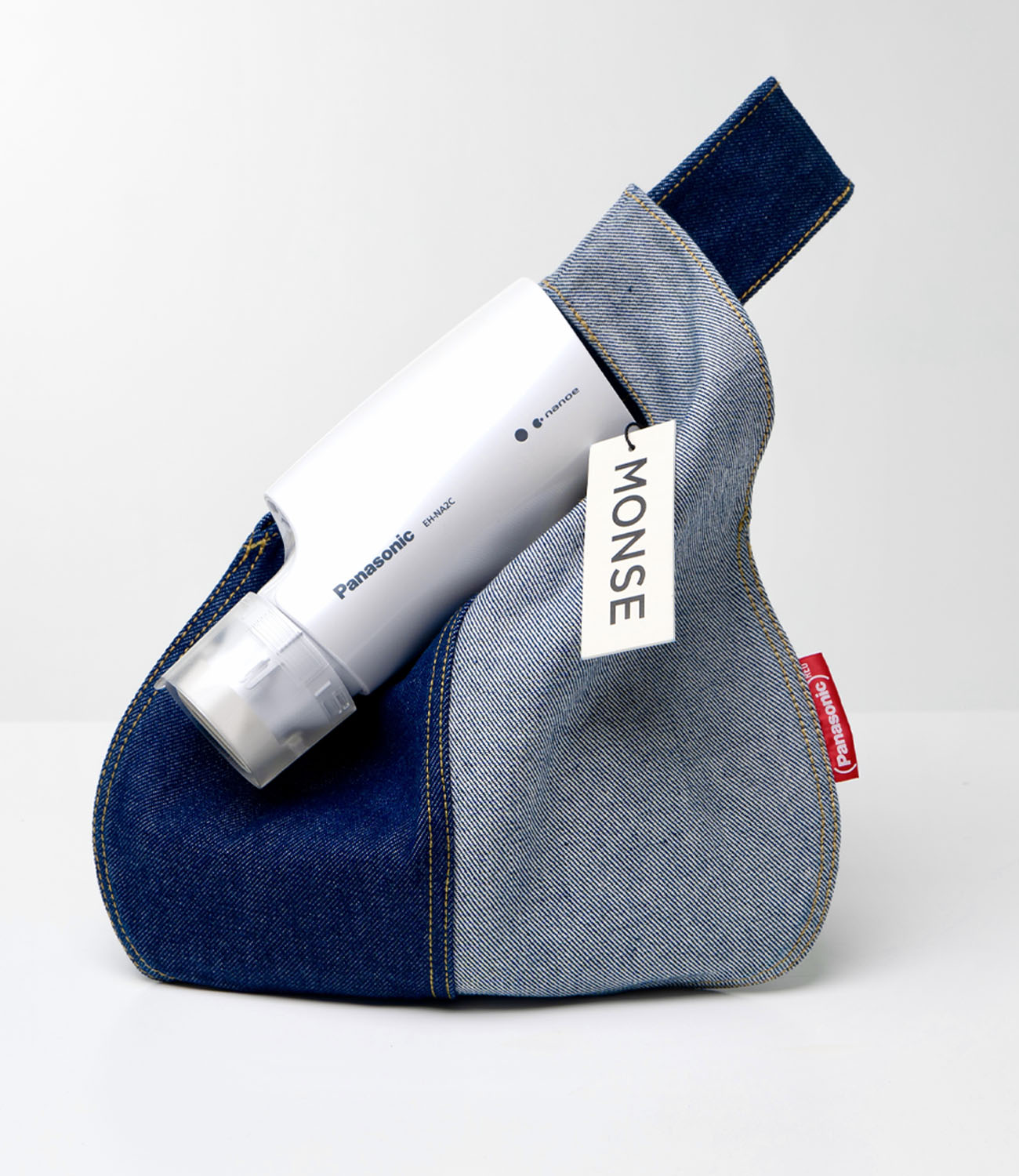 Small hair dryer in a denim bag